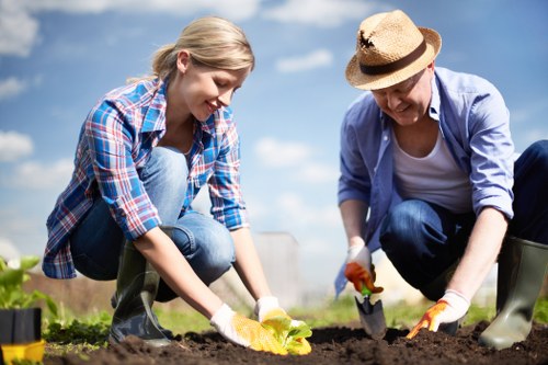 Local gardeners in New Southgate caring for plants